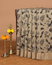 Chikku color birds printed assam silk saree with zari striped border & chit pallu along with butta printed blouse