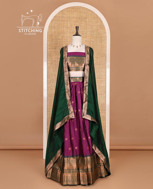 Purple taffeta silk half saree, zari buttas with contrast green traditional zari border, matching zari blouse, and contrast plain zari border dhavani