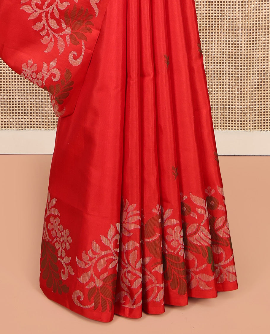 Red Mayuri Soft Silk Saree, Subtly Sparkled with Buttas, Highlighted by a Self-Border of Floral and Peacock Design, Pallu Mirrors the Same Design, and a Matching Blouse