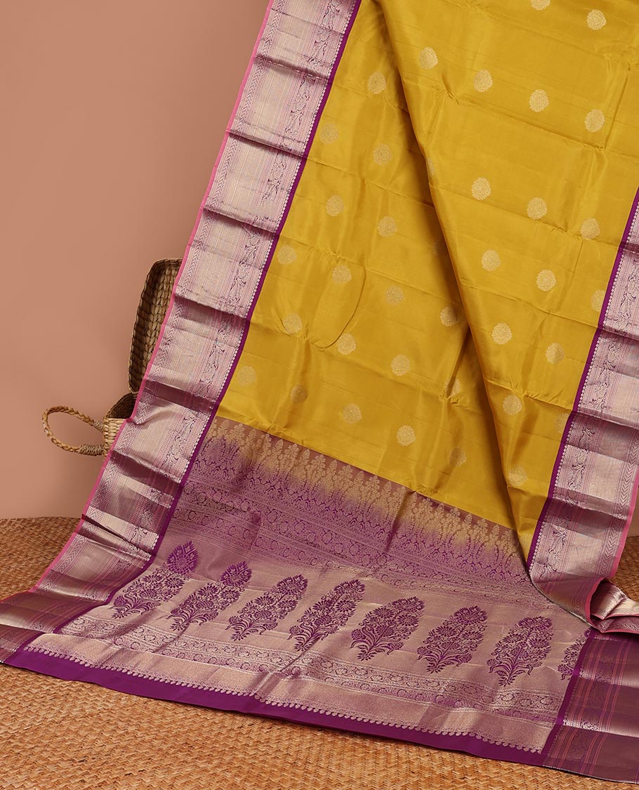 Green floral buttas silk saree with contrast border of muthu, manga , kuyil kann design & floral zari design pallu