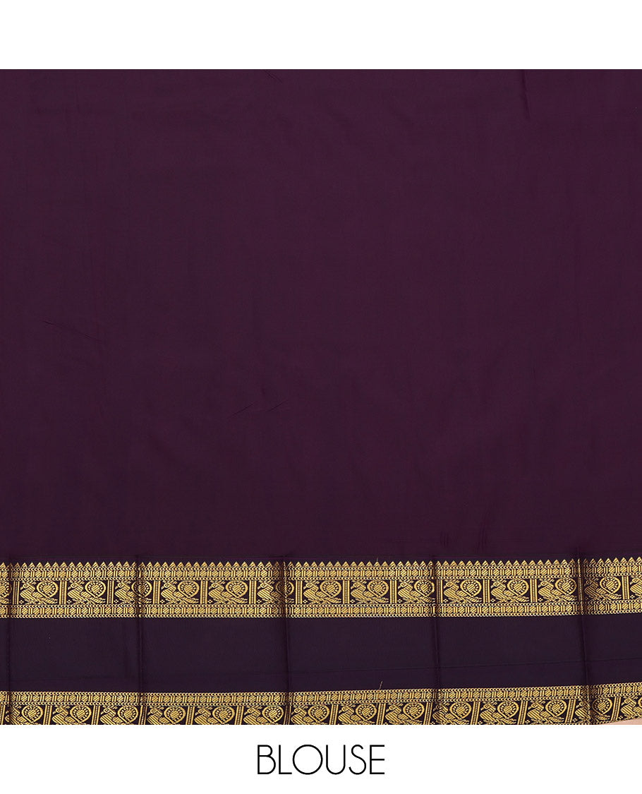 Rust Budget Silk Saree, Accentuated with Peacock and Chakram Buttas All Over Its Body, Complemented by a Contrast Traditional Zari Rettai Pettu Border of Peacock Designs, Pallu Steeped Thilakam Designs, and Paired with a Contrast Blouse