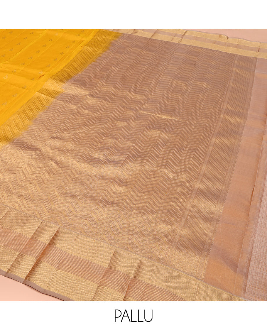 Yellow Vasundhara Lite Silk Mix Saree, Sparsely Woven with Zari Buttas, Complemented by a Contrast Border of Geometric Designs, Boldly Accentuated Pallu of Chevron Designs, and Paired with a Contrast Blouse