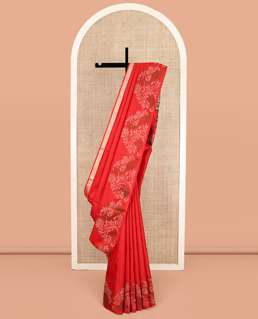 Red Mayuri Soft Silk Saree, Subtly Sparkled with Buttas, Highlighted by a Self-Border of Floral and Peacock Design, Pallu Mirrors the Same Design, and a Matching Blouse