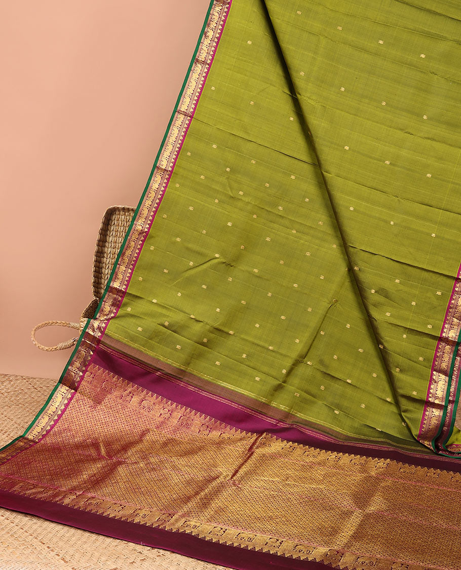 Green buttas kancheepuram silk saree with contrast border of rekku, muthu, yaanai design & checked zari design pallu