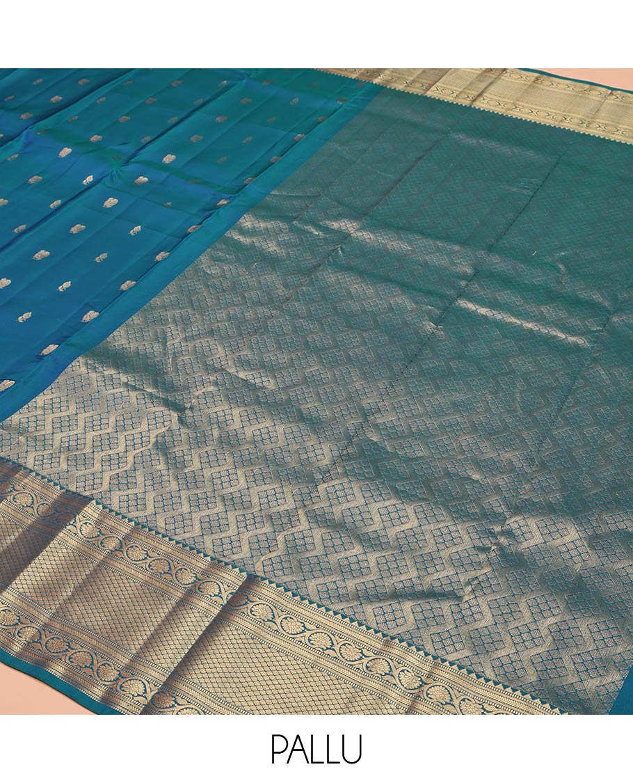 Blue Vasundhara Lite Silk Mix Saree, Graced with Zari Buttas All Over Its Body, Highlighted by a Zari Border of Rekku, Muthu, Kathir, Kodi Visiry, and Jaal Designs, Grand Jaal Pallu, and Paired with a Matching Blouse