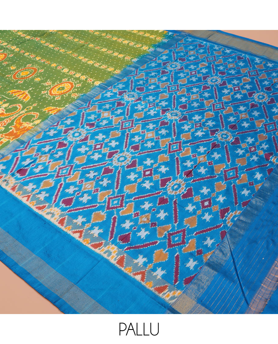 Green Ikkat Silk Saree, Enriched with Elephant Motifs Ikkat Weave All Over Its Body, Complemented by a Contrast Temple Border of Diamond Designs, Pallu of Ikkat Designs, and Paired with a Contrast Blouse