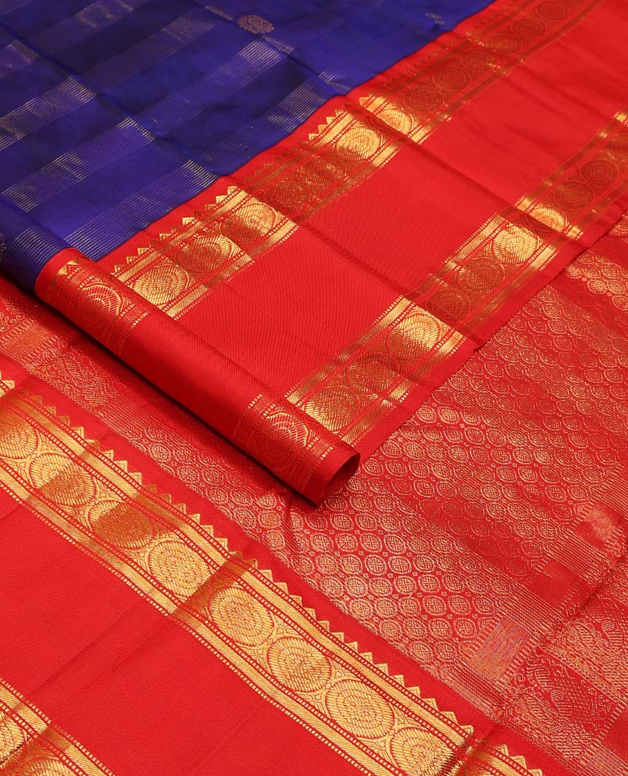 Blue zari stripes, and buttas Kanchipuram korvai silk saree, contrast rettai pettu neer korvai border of thilakam mokku, neli, muthu, kodi visiry, manga, yaanai, and mayil designs, and vanki design pallu