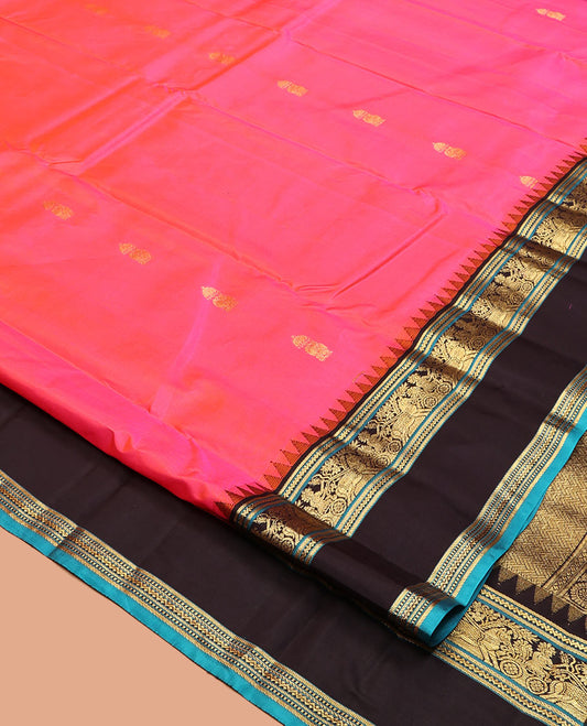 Pink Vasundhara Silk Saree, Embellished with Zari Buttas, Complemented by Contrast Rettai Pettu Temple Border, Grand Paiyadi Kattam Pallu, and a Contrast Blouse