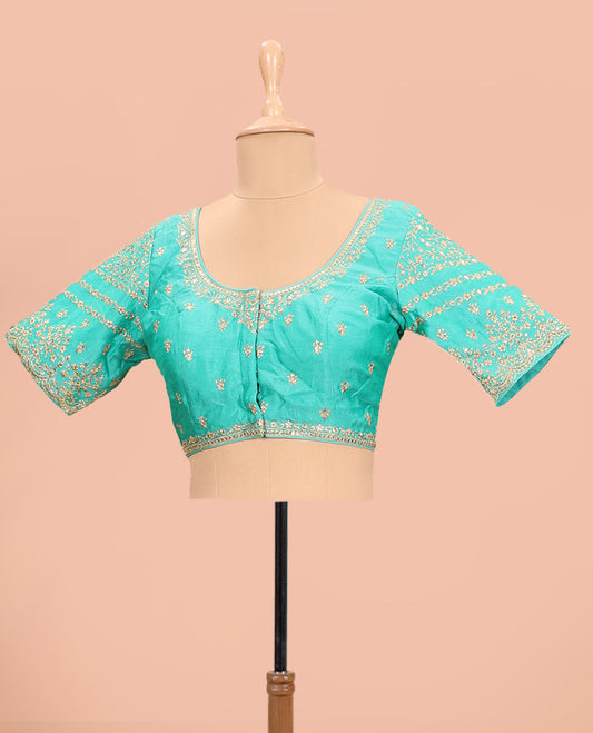 Turquoise intricately floral embroidered round neck with elbow sleeve  raw-silk blouse