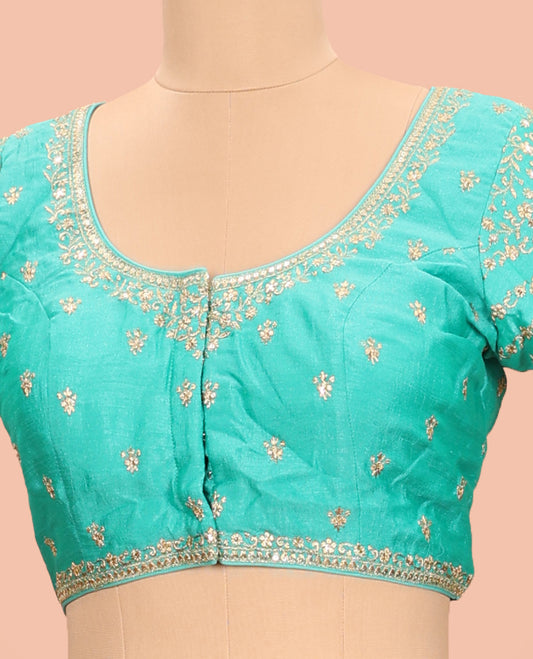 Turquoise intricately floral embroidered round neck with elbow sleeve  raw-silk blouse