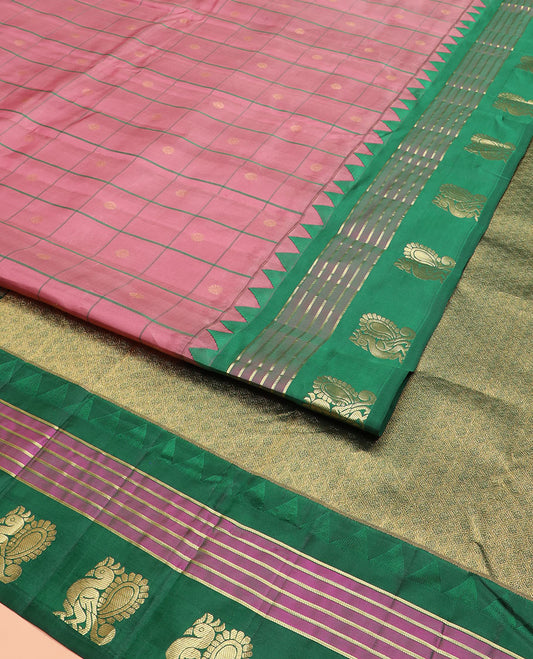 Pink Vasundhara Silk Saree Enthralled with Zari Butta Enclosed Checks, Complemented by a Contrast  Thazampoo Rekku Border of Banaras, and Mayil Designs, Zari Woven Pallu of Jaal Designs, and a Contrast Blouse
