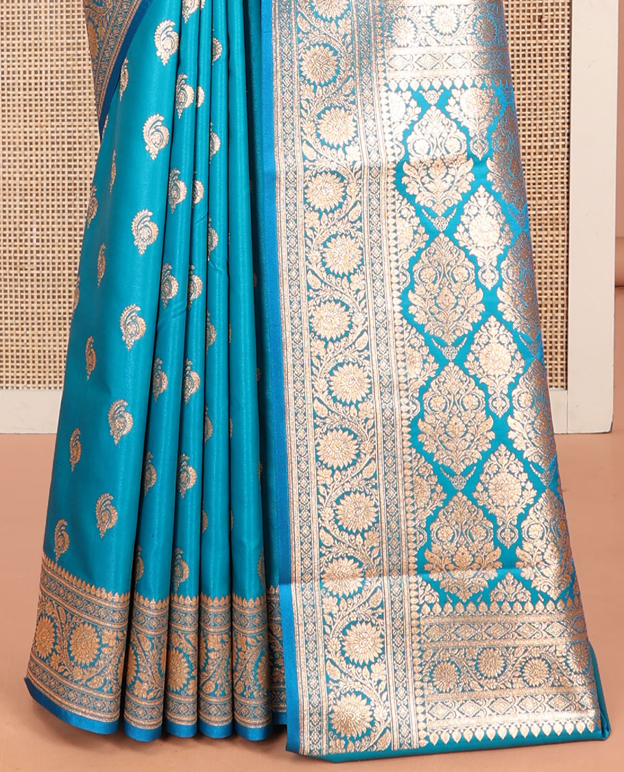 Blue Banarasi Nylon Saree, Bedecked with Zari Buttas, a Traditional Zari Border, Intricate Pallu, and a Matching Blouse