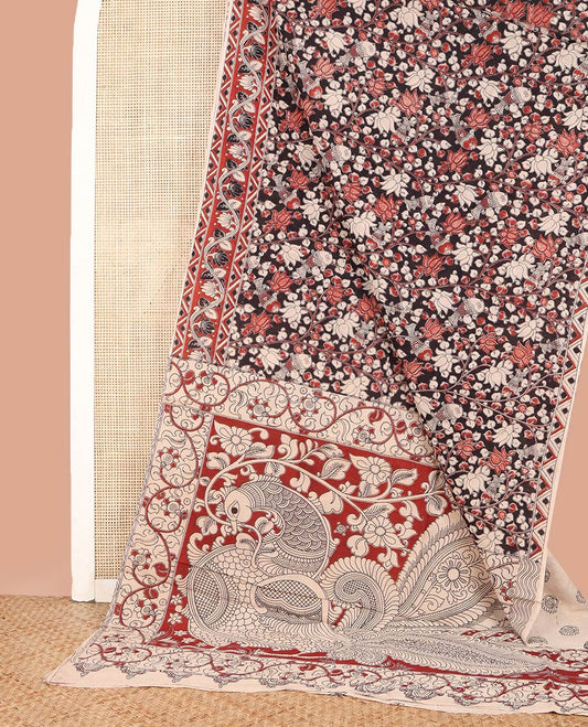 Black Machine-Printed Kalamkari Cotton Saree, Enthralled with Lotus and Fish Motifs Printed on Its Body, Contrast-Floral-Geametric Printed Border, Pallu of Peacock Print, and Paired with a Printed Blouse