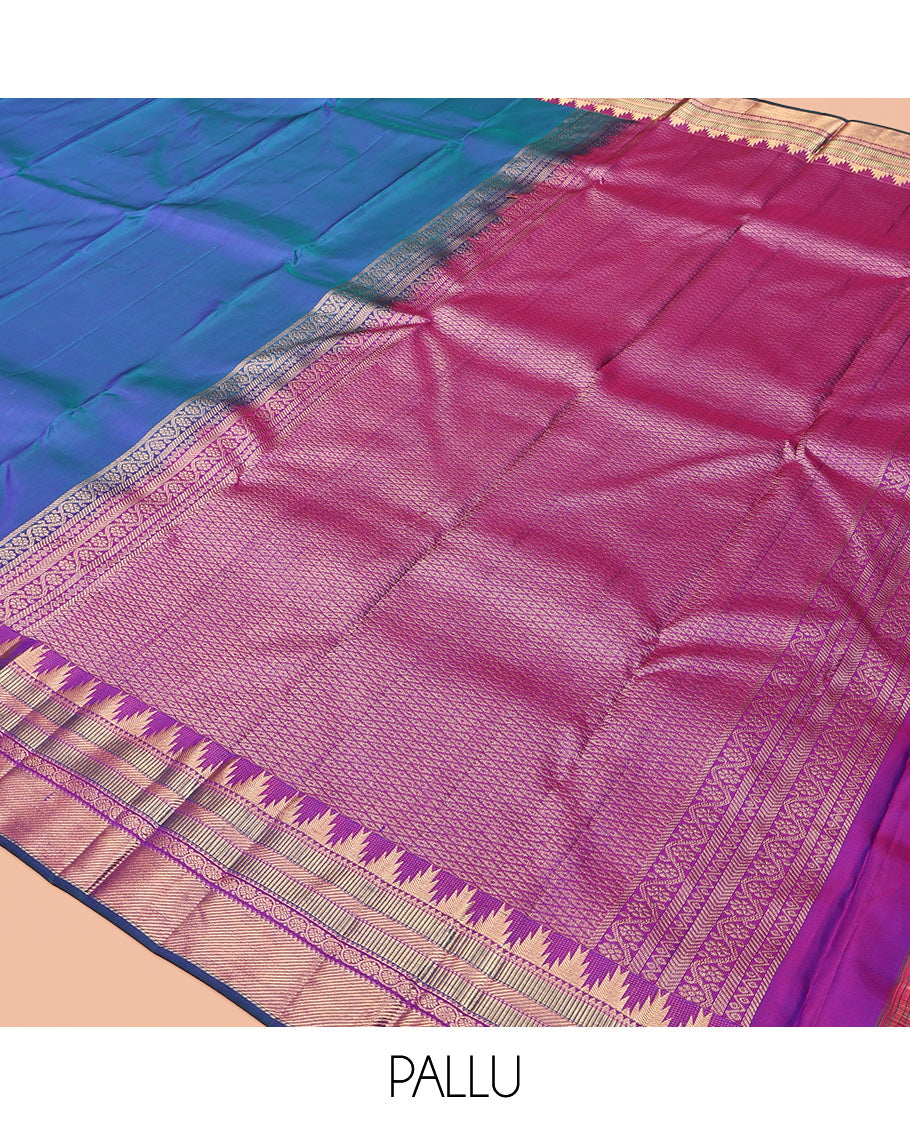 Blue Plain Kanchipuram Silk Saree, Complemented by a Contrast Border of Thazampoo Rekku, Banaras, Muthu, and Kodi Visiry Designs, Mayil Kann Pallu, and a Contrast Blouse