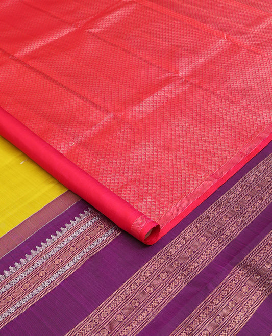 Borderless green-pink half-and-half Kanchipuram silk saree features floral meena buttas, and ara maadam design, contrast traditional motifs zari woven pallu