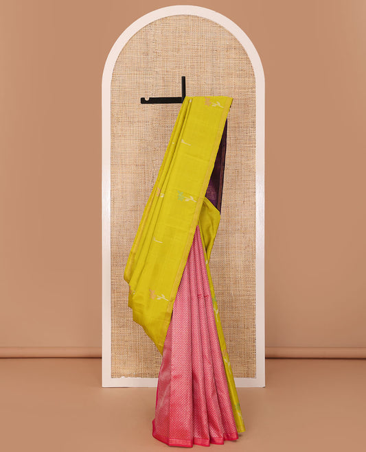 Borderless green-pink half-and-half Kanchipuram silk saree features floral meena buttas, and ara maadam design, contrast traditional motifs zari woven pallu