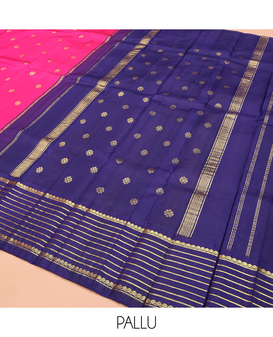 Pink Kanchipuram Silk Saree, Decked Up with Zari Buttas on Its Body, Complemented by a Contrast One-Sided Korvai Border of Thilakam Mokku, and Banaras Designs, Pallu Steeped with Kamalam Zari Designs, and Comes Without a Blouse