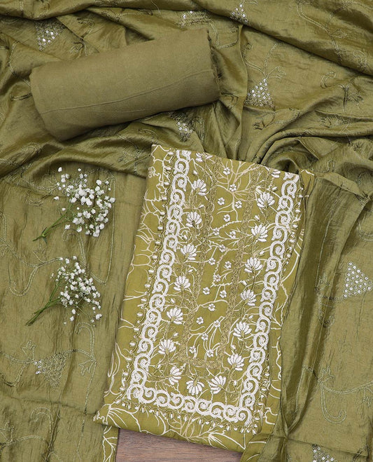 Green material chudidar set, vine printed with neck embroidered top, plain bottom and sequins embroidered dupatta