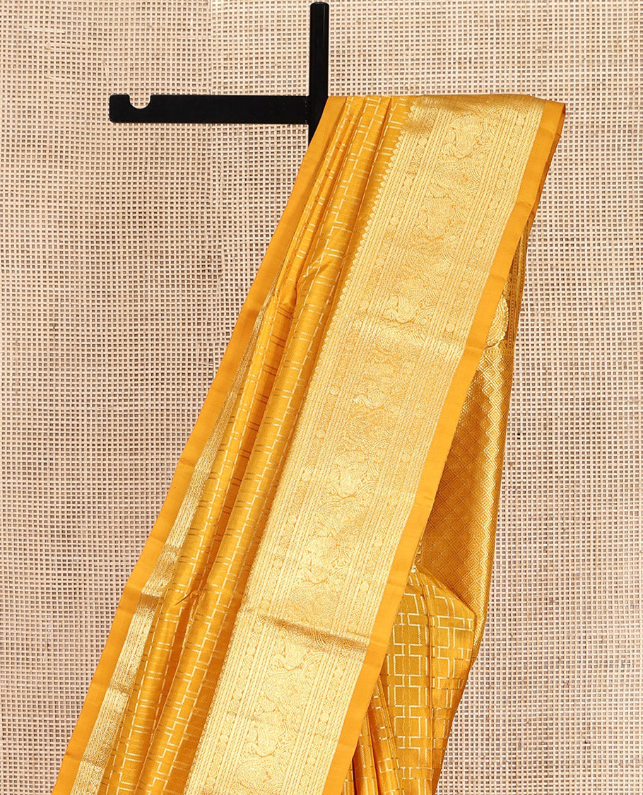 Yellow Venkatagiri Silk Saree, Gleamed Up with Geometric Design All Over Its Body, Highlightad by a Traditional Zari Design Border, Grand Jaal Pallu, and Paired with a Matching Blouse