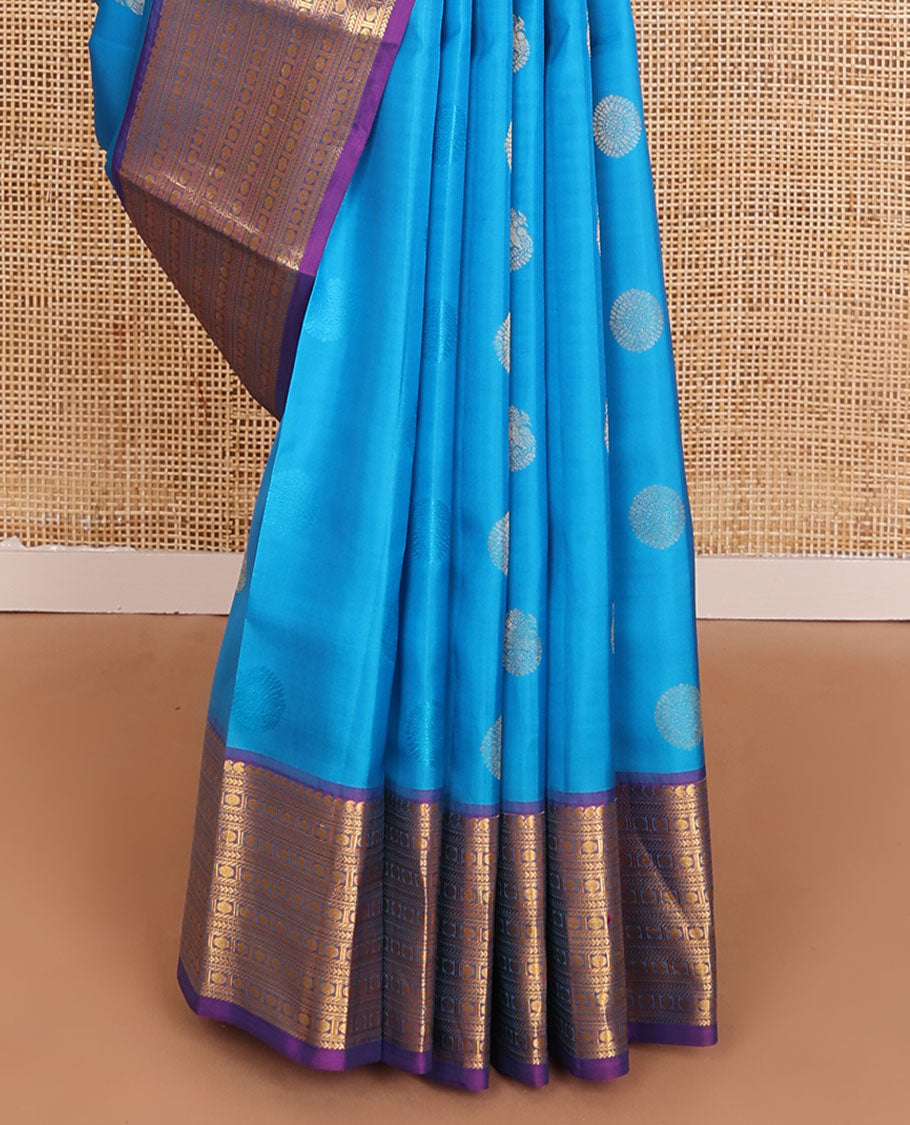 Blue zari buttas Vasundhara elite silksaree, contrast border of manga mokku,muthu,kathir,banaras & poun & scallop pallu
