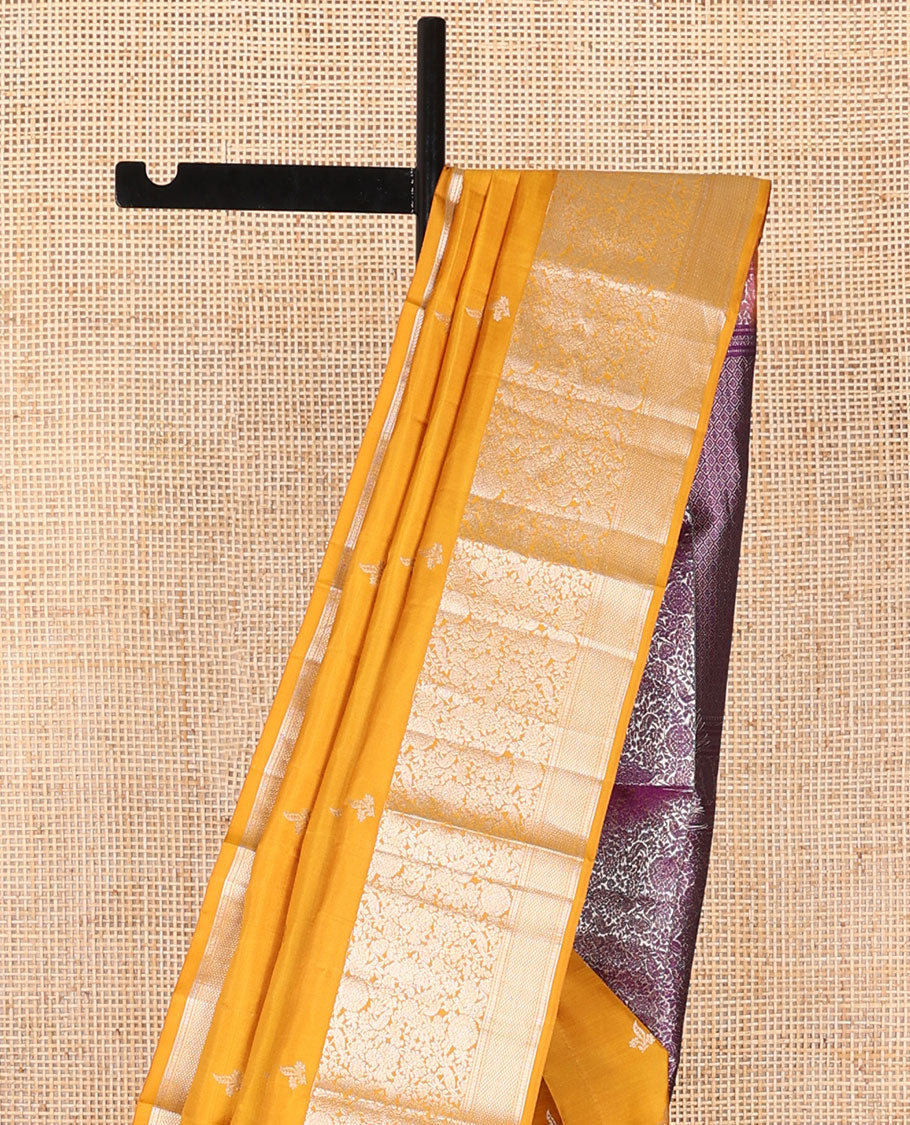 Orange buttas silk saree with self border of floral, banaras design & floral design pallu