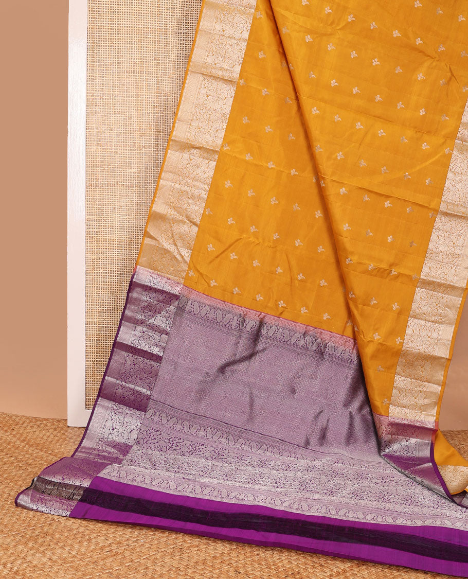 Orange buttas silk saree with self border of floral, banaras design & floral design pallu