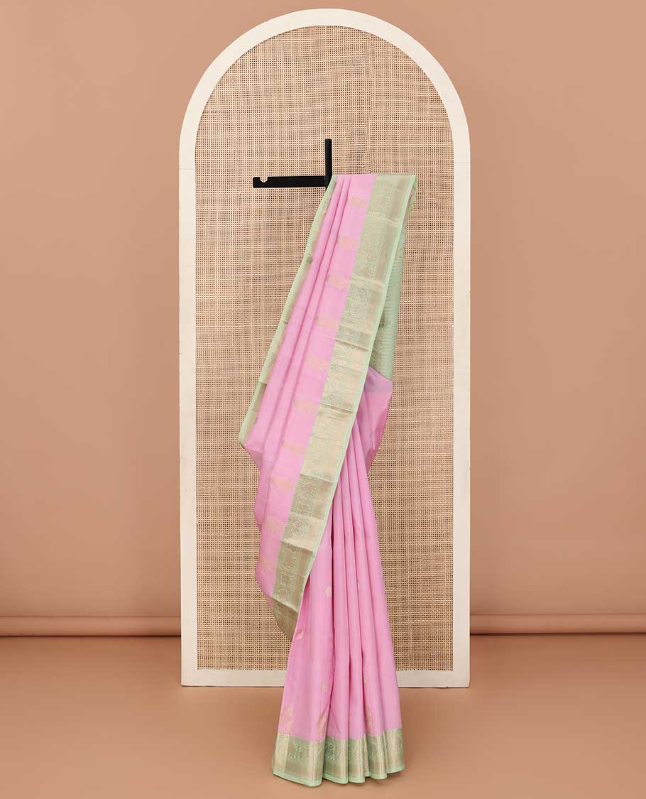 Pink kamalam and singam buttas silk saree, contrast border of thilakam, paisa, vanki, yaanai, kuthirai and iru thalai pakshi, and zari woven pallu