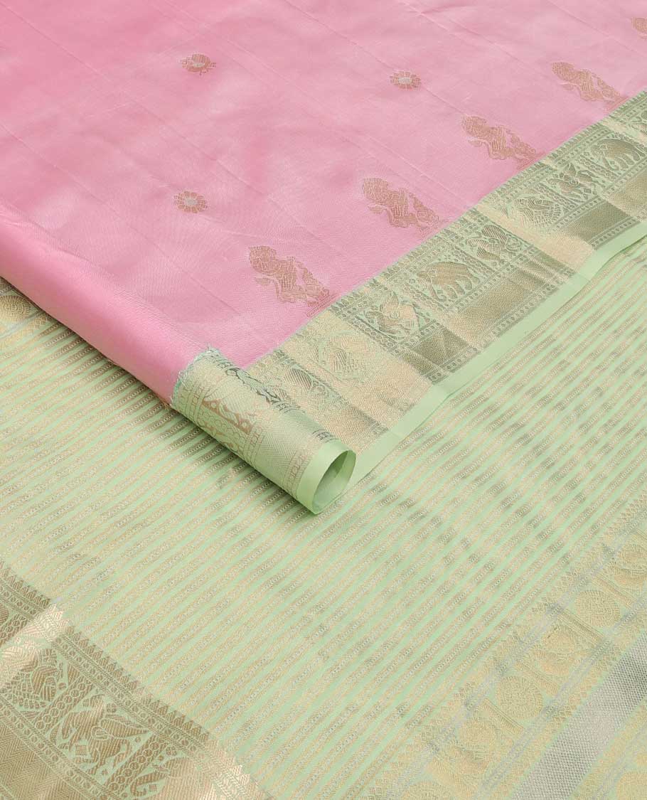 Pink kamalam and singam buttas silk saree, contrast border of thilakam, paisa, vanki, yaanai, kuthirai and iru thalai pakshi, and zari woven pallu