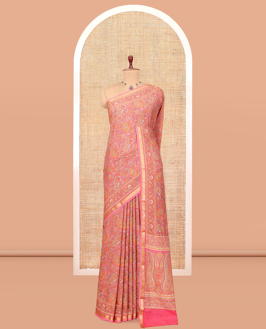 Pink Printed Silk Saree, Decked Up with Floral-Paisley Print, a Traditional Zari Border, Paisleys Pallu, and a Matching Blouse