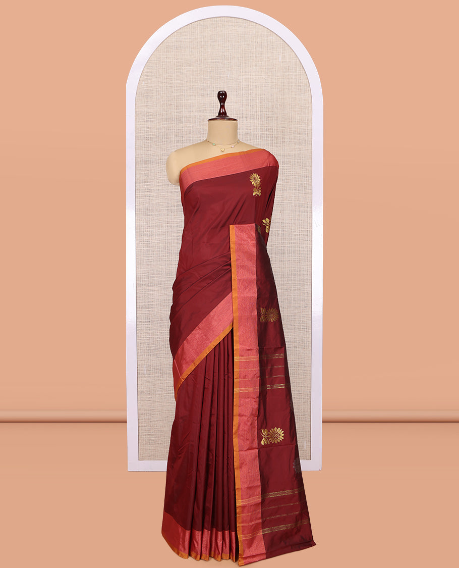 Maroon Arani Saree, Adorned with Floral Zari Buttas, a Contrast Border, Contrast Floral Buttas Pallu, and a Matching Blouse