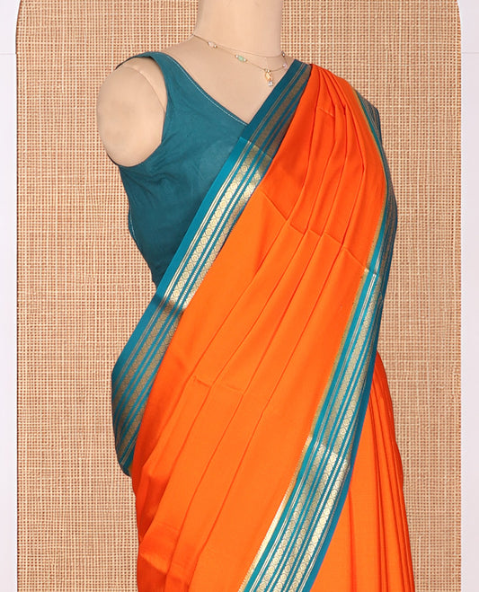Orange Plain Mysore Silk Saree, Complemented by a Contrast Traditional Zari Border, Zari Striped Pallu, and a Contrast Blouse