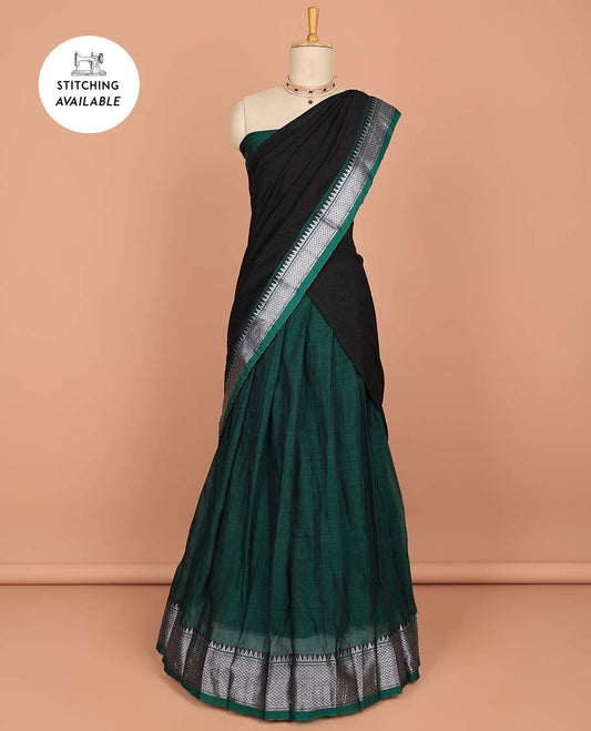 Green cotton half saree with contrast traditional border, plain blouse & plain dhavani with zari design border