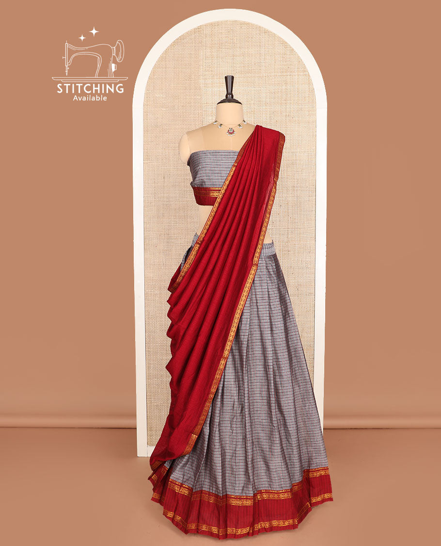 Grey cotton half-saree, checked with contrast traditional zari border skirt, matching blouse and a contrast zari piping bordered dhavani