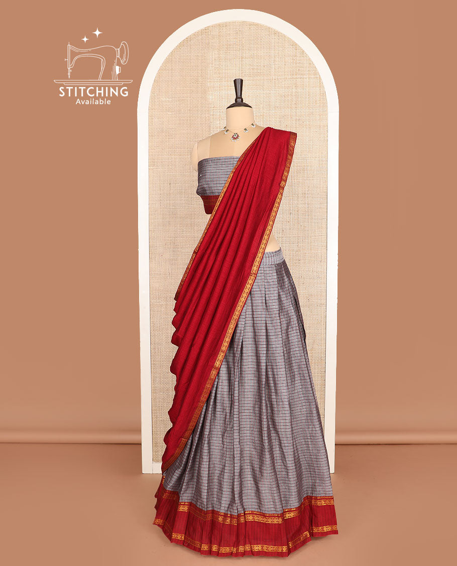 Grey cotton half-saree, checked with contrast traditional zari border skirt, matching blouse and a contrast zari piping bordered dhavani