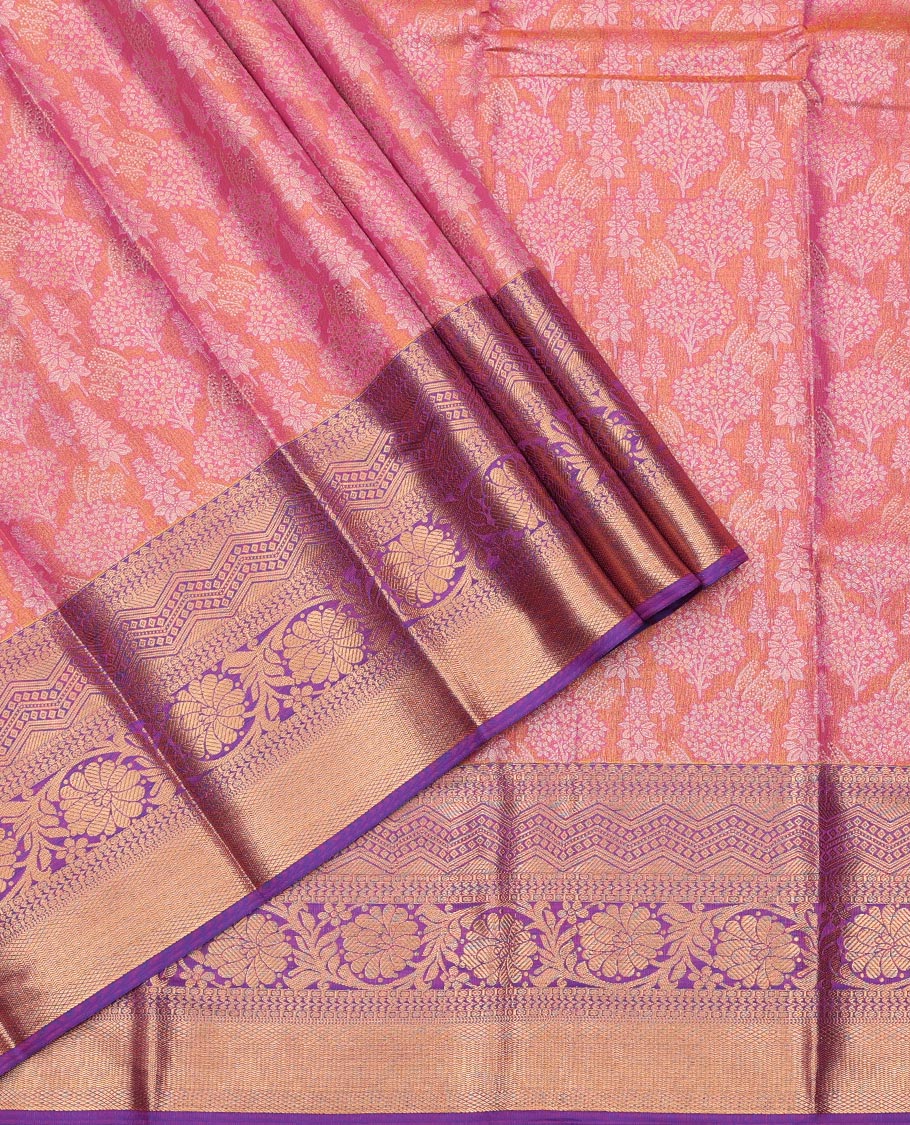 Peach Art Silk Pavadai Material Set, Masterfully Woven with Floral Jacquard on Its Skirt, Complemented by a Contrast Traditional Zari Design Border, and Paired with a Matching Blouse
