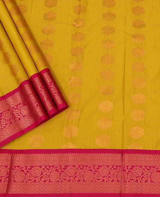 Yellow Art Silk Pavadai Material Set Featuring Zari Buttas Skirt, Complemented by a Contrast Traditional Zari Design Border, and Paired with a Contrast Blouse