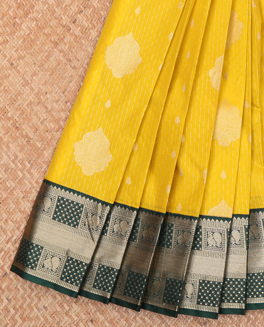 Yellow Budget Silk Saree, Delicately Woven with Zari Buttas All Over Its Body, Complemented by a Contrast Traditional Zari Design Border of Peacock Designs, Pallu Features Jaal Designs, and Paired with a Contrast Blouse
