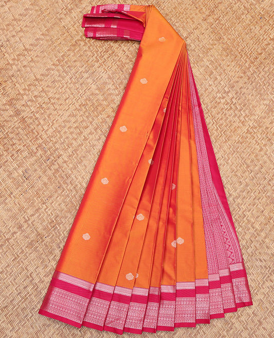 Orange Budget Silk Saree, Subtly Detailed with Zari Buttas All Over Its Body, Complemented by a Contrast Traditional Zari Design Border, Geometric-Patterned Pallu, and Paired with a Contrast Blouse