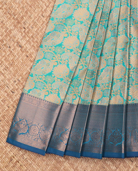 Blue jacquard gift saree, contrast traditional zari design border, and zari-rich jaal pallu