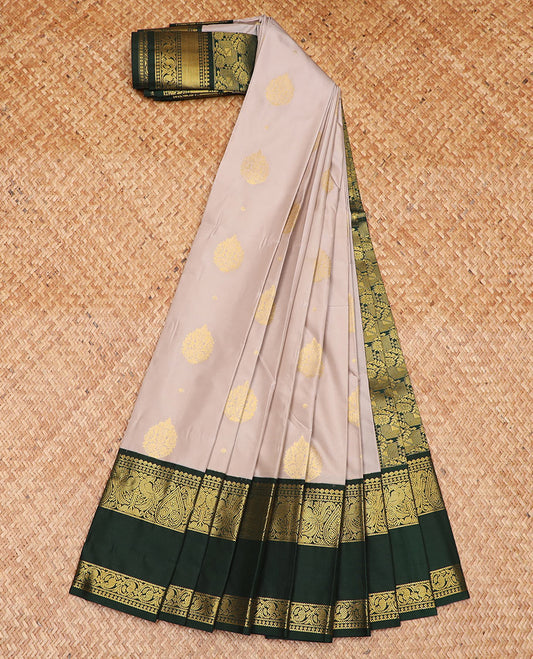 Beige zari buttas gift saree, contrast traditional zari design rettai pettu border, and intricate pallu
