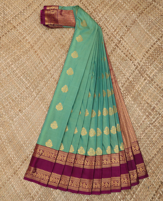 Green Budget Silk Saree Beautified with Zari Buttas, Complemented with a Contrast Traditional Zari Design Rettai Pettu Border, Grand Ogee Patterned Pallu, and Paired with a Contrast Blouse