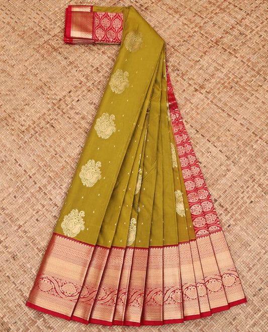 Green Budget Silk Saree, Gleamed Up with Zari Buttas on Its Body, Complemented by a Contrast Traditional Zari Border of Floral Creeper Designs, Intricately Designed Pallu, and Paired with a Contrast Blouse