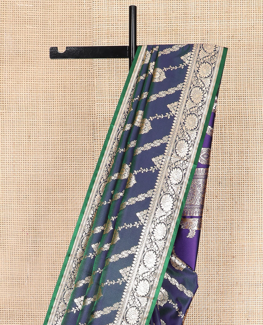 Blue jacquard banarasi silk saree, floral creeper design border, and pallu of Mughal-inspired intricate motifs
