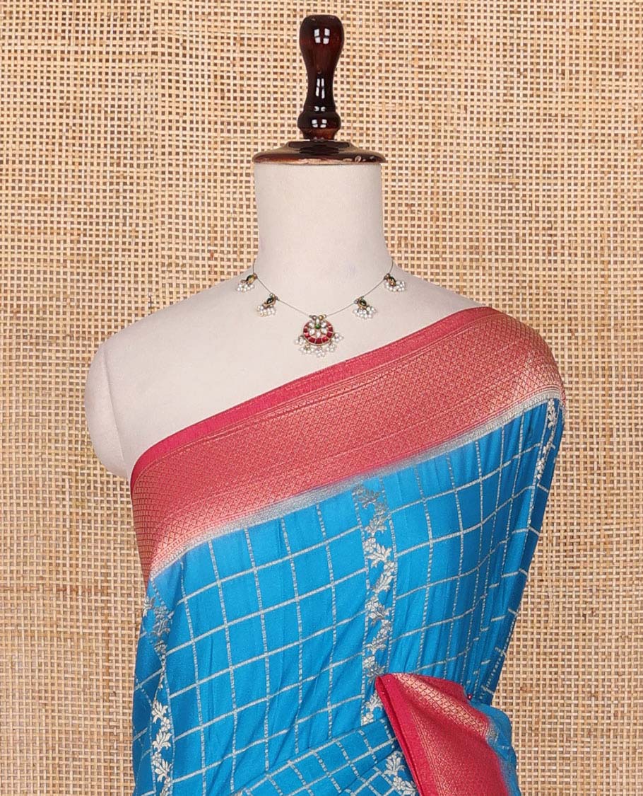 Blue zari jacquard fancy crepe saree, contrast traditional zari border & pallu is floral creeper design