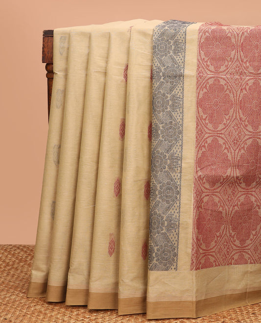 Light Sandal buttas Kanchi cotton saree, contrast plain border, and pallu of ogee patterns
