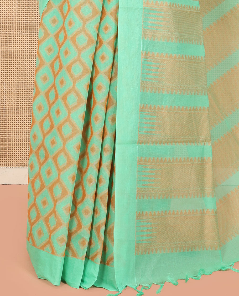 Green Coimbatore Cotton Saree, Accentuated with Diamond Designs on Its Body, Subtle Self-Border, Pallu of Temple Patterns, and Paired with a Matching Blouse