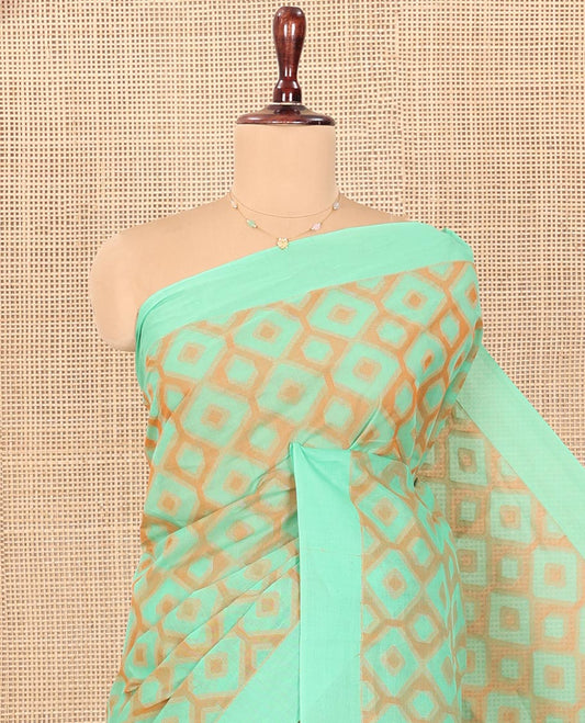 Green Coimbatore Cotton Saree, Accentuated with Diamond Designs on Its Body, Subtle Self-Border, Pallu of Temple Patterns, and Paired with a Matching Blouse
