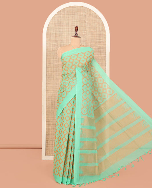Green Coimbatore Cotton Saree, Accentuated with Diamond Designs on Its Body, Subtle Self-Border, Pallu of Temple Patterns, and Paired with a Matching Blouse