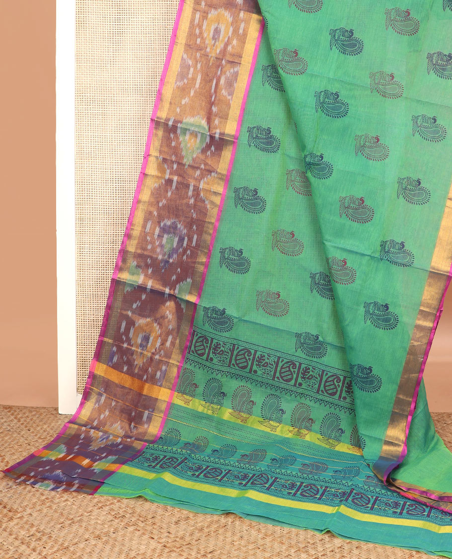 Green peacock printed Andhra cotton saree, contrast ikkat zari border, and pallu of peacock, and paisleys