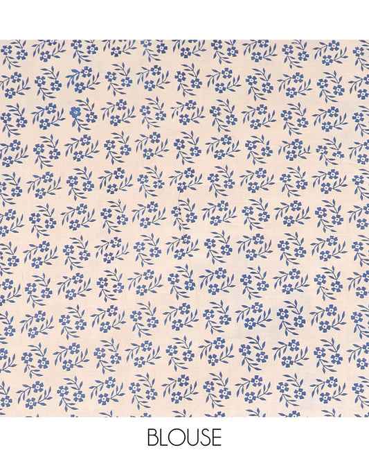 Yellow batik floral machine-printed cotton saree, contrast printed border, and pallu of kalamkari peacock print